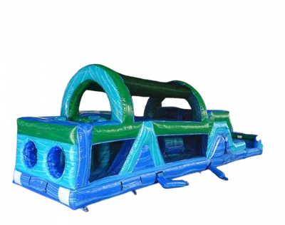 50' Island Drop Dual Lane Obstacle Course delivered and set up on a backyard lawn for a party in Fort Myers, FL